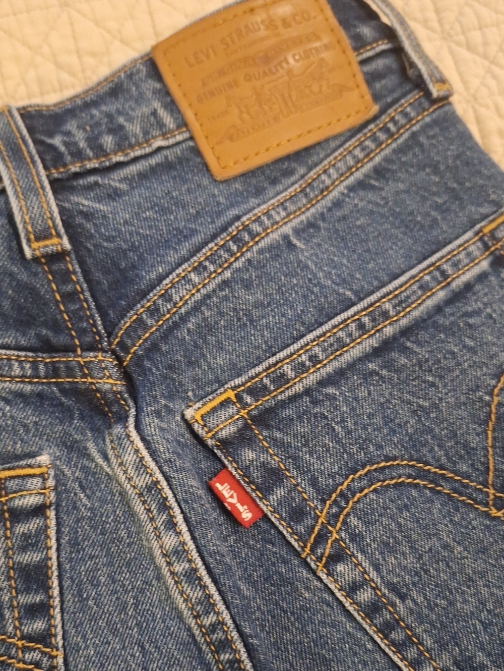 Levi's Woman's 501 medium denim jeans. Ribcage boot size 24, pre 1971